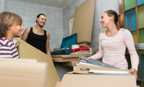 Professional man with a moving van loading furniture