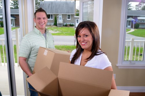 Moving truck parked at a home during a relocation