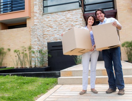 Move Van team packing and loading a house move